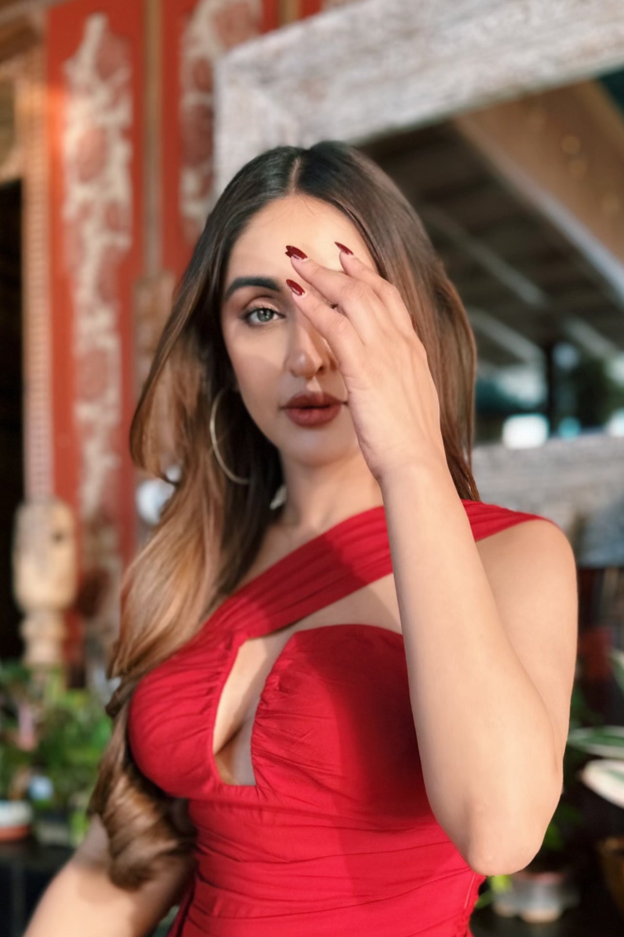Krystle D'Souza close up in Ilya red modal mini dress — plunging neckline detail, Label WildChild India